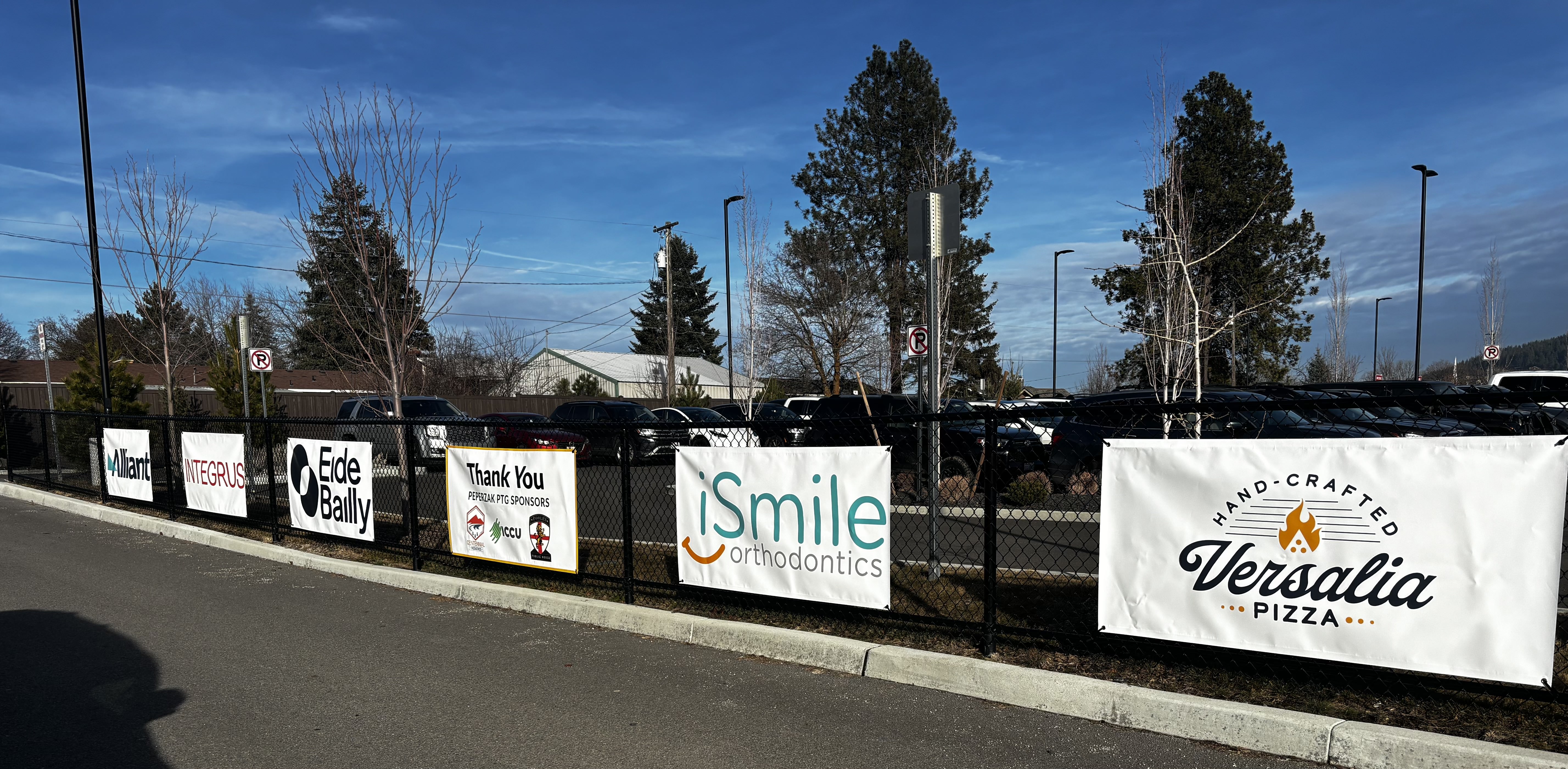 corporate sponsorship banners on fence