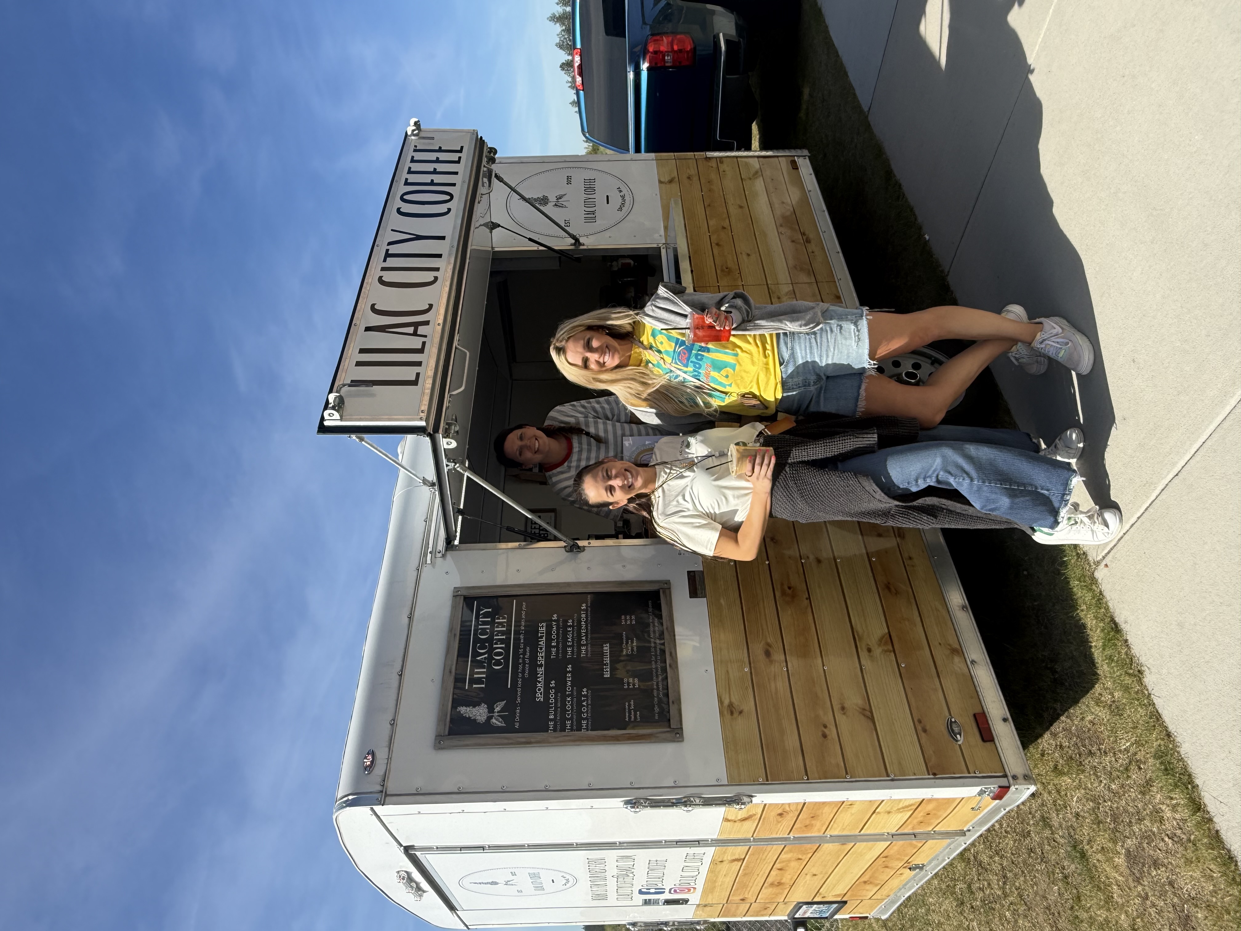 women in front of coffee truck 