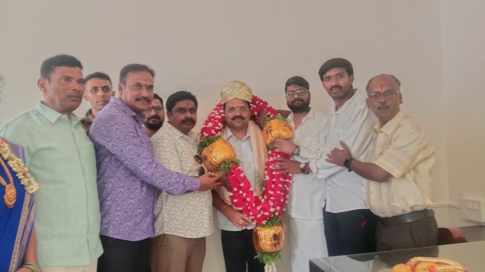 A glass jar being filled with coins, symbolizing savings.