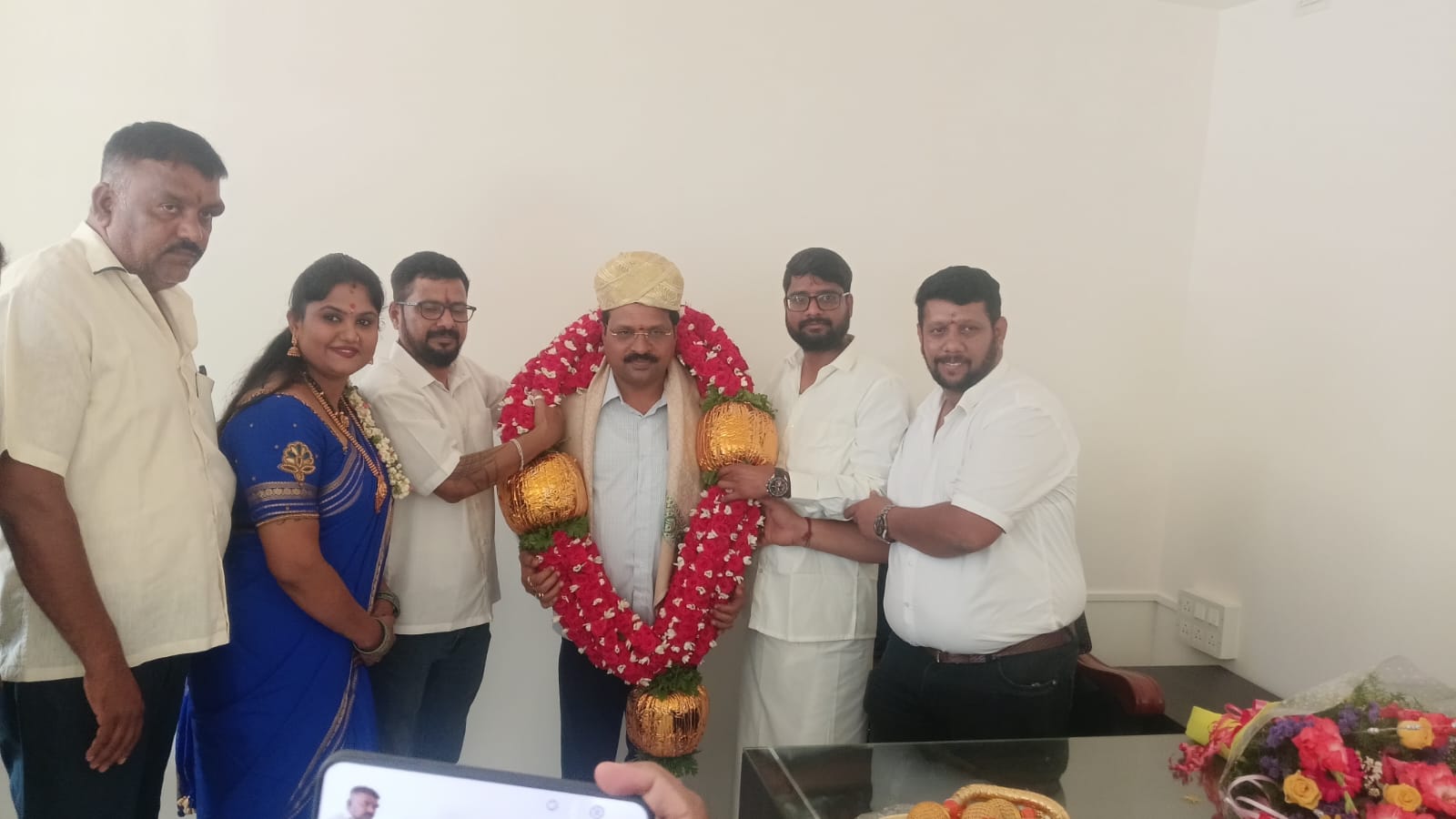 A diverse group of professionals in a modern office having a productive meeting.