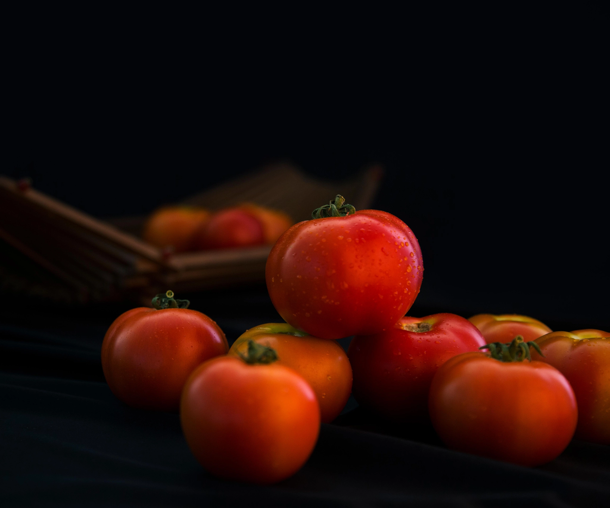 Image of juicy red tomatoes by semillas fitto seeds India shot in a professional studio setup, clean and professional lighting.