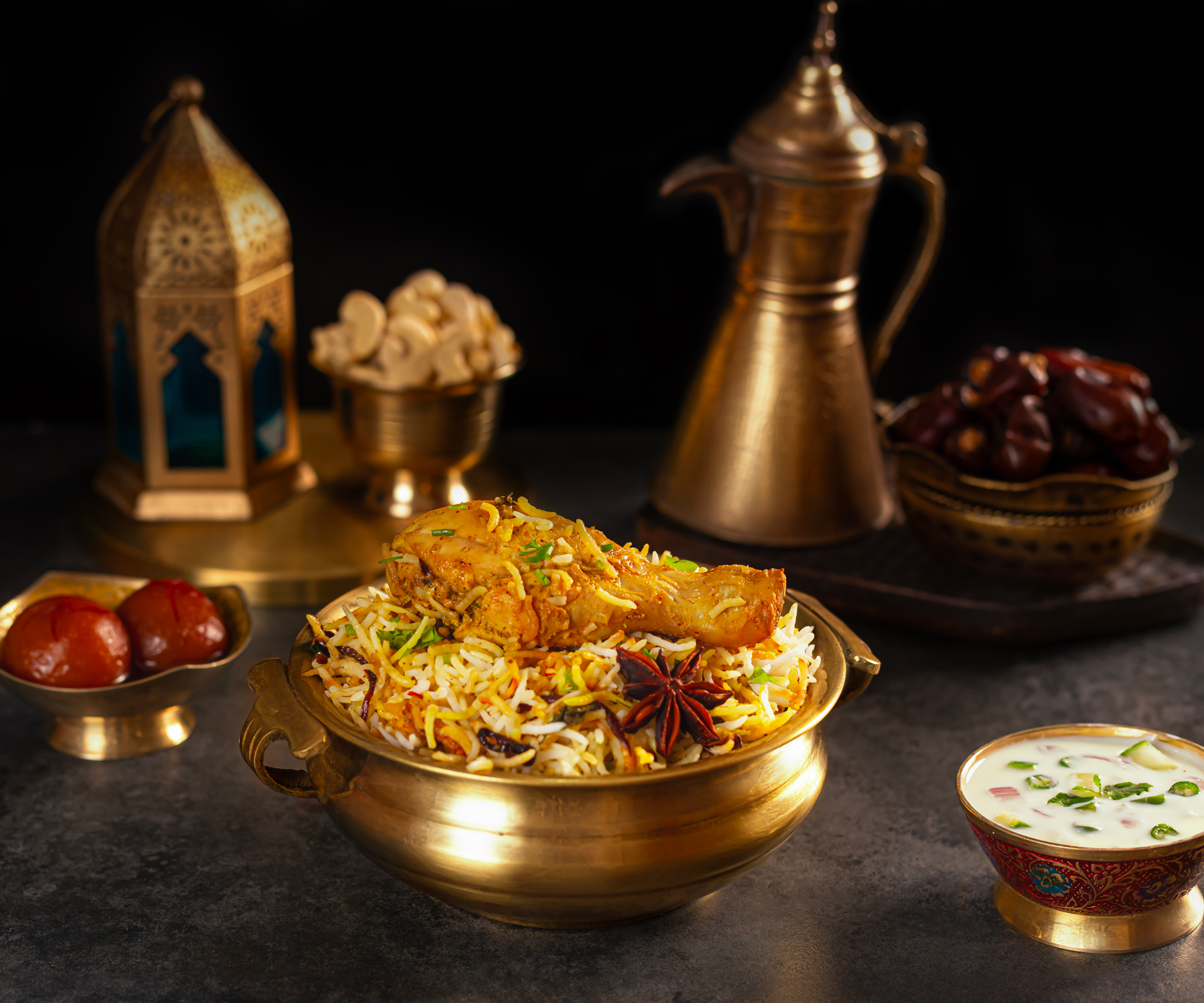 Food photography of chicken Biryani kept on a handi, 45 degree angle shot of chicken biryani kept on a textured base and dark background.