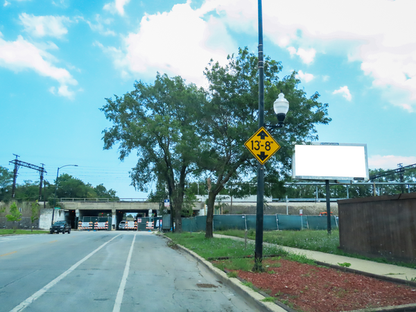 103rd St SS 125ft E/O St Lawrence Av F/W - 1