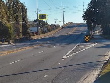 N/S COMM RD., 150' E/O FLANDERS F/W