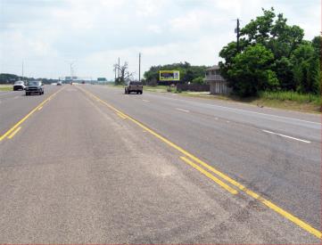 S/S UNIVERSITY DR. 1 MI W/O FM 2818, R/H