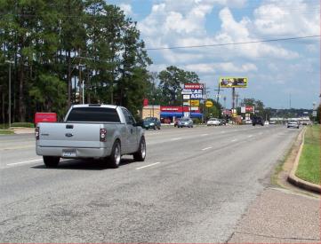 N/S HWY 105, .4 MILE W/O I-45 F/W L/H