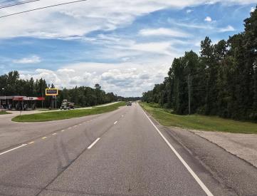 E/S HWY 59 1ST S/O CR 57 F/N