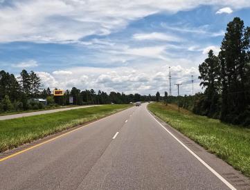 E/S HWY 59 3RD S/O CR 57 F/N