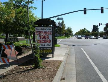 East side of Forest Ave, 30' north of E 20th St