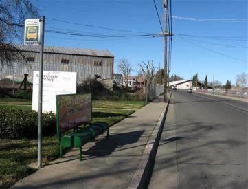 South side of Bridge St, 100' east of Walton Ave