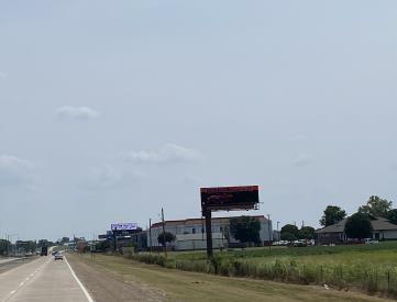 US 65B (Martha Mitchell Expressway) W/S 1000' N/O Saracen Casino, NF