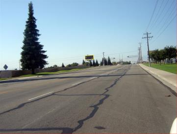 EL ASHE RD. 750' S/O DISTRICT BLVD.