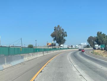 HWY 99 WL .75 MI S/O BRIGGSMORE AVE. FS