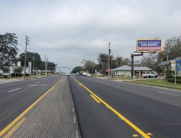 N/S John Sims Pkwy E/O Partin Dr F/E