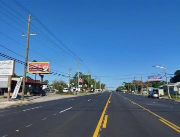 S/S John Sims Pkwy E/O Partin Dr F/E