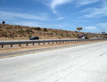 AV FWY 14 EL .5 MILES N/O AVENUE N