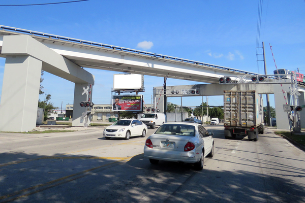 NW 74th St NS 40ft W/O NW 69th Av F/W - 1