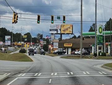 E/S HWY 27 BYPASS @ ROOP ST S/F LEFT IN