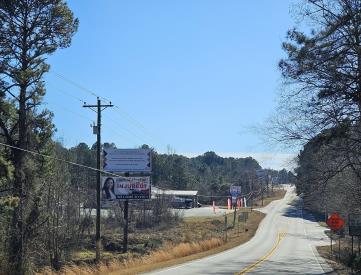 E/S HWY 92 9/10 MILE S/O HWY 120 N/F BOT