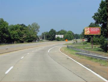US 65 EXPY E/S 50' E/O LARCH