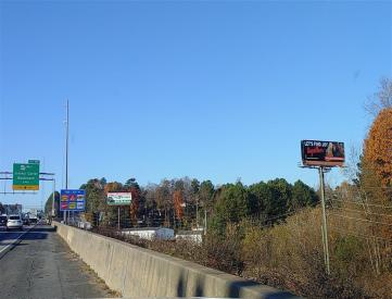 W/S I-85 .9 MI N/O JIMMY CARTER BLVD RHR F/NE