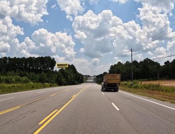 E/S HWY 59 1ST S/O CO RD 55