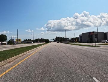 N/S HWY 90 1ST W/O I-65 F/W
