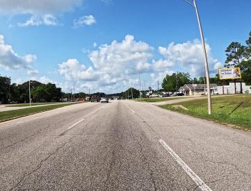 N/S HWY 90 E/O DEMETROPOLIS RD F/E