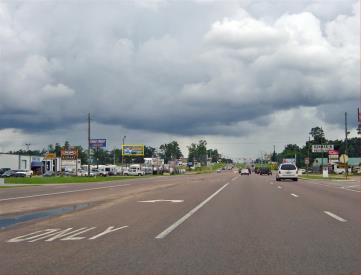 W/S HWY 90 1ST S/O KOOIMAN RD. F/W
