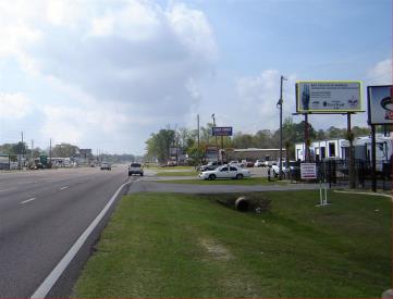 W/S HWY 90 1ST S/O KOOIMAN RD. F/NE
