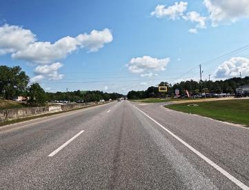 S/S HWY 90 3RD E/O RANGELINE F/SW