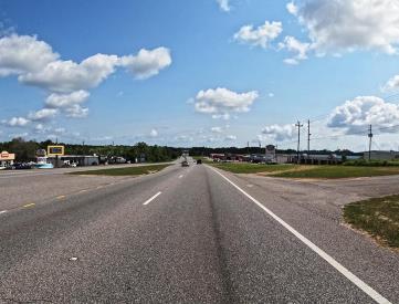 N/S HWY 90 2ND E/O NEVIUS F/W