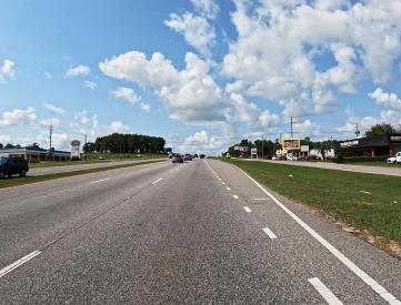 N/S HWY 90 2ND E/O NEVIUS F/E