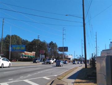 N/S JIMMY CARTER BLVD .9M W/O I-85 LHR F/W