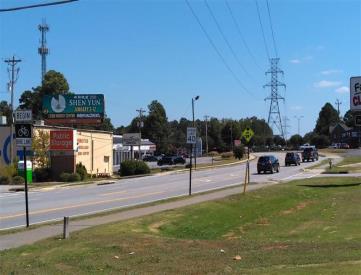 N/S LOWER ROSWELL RD 1000' E/O JOHNSON FERRY LHR F/W