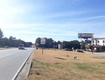 W/S PEACHTREE IND BLVD 1000' S/O MEDLOCK BRIDGE RHR F/N