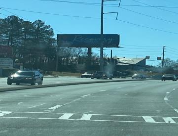 N/S JIMMY CARTER BLVD .5M W/O I-85 LHR F/W