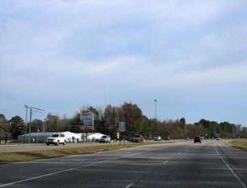 E/S N.E. BLVD. 1 MI. S/O WET HWY F/N (TOP)