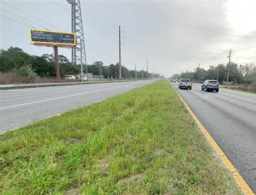 N/S Hwy 98 100' E/O Ridgewood Ave F/W