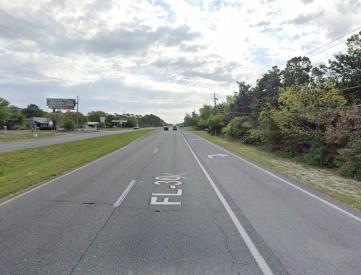 N/S Hwy 98 @ Woodland Park Cir F/W