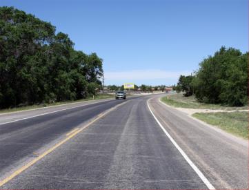 HWY 214 W/S 1800' S/O BROADWAY