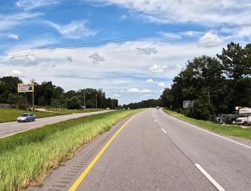 W/S HWY 59 N/O CR 57 F/S