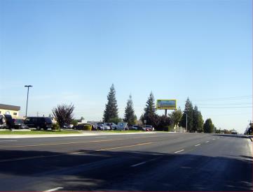 NL DISTRICT BLVD. 1500' E/O ASHE RD.