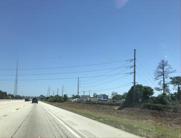 W/S TURNPIKE 1200' N/O SR 714 S/B