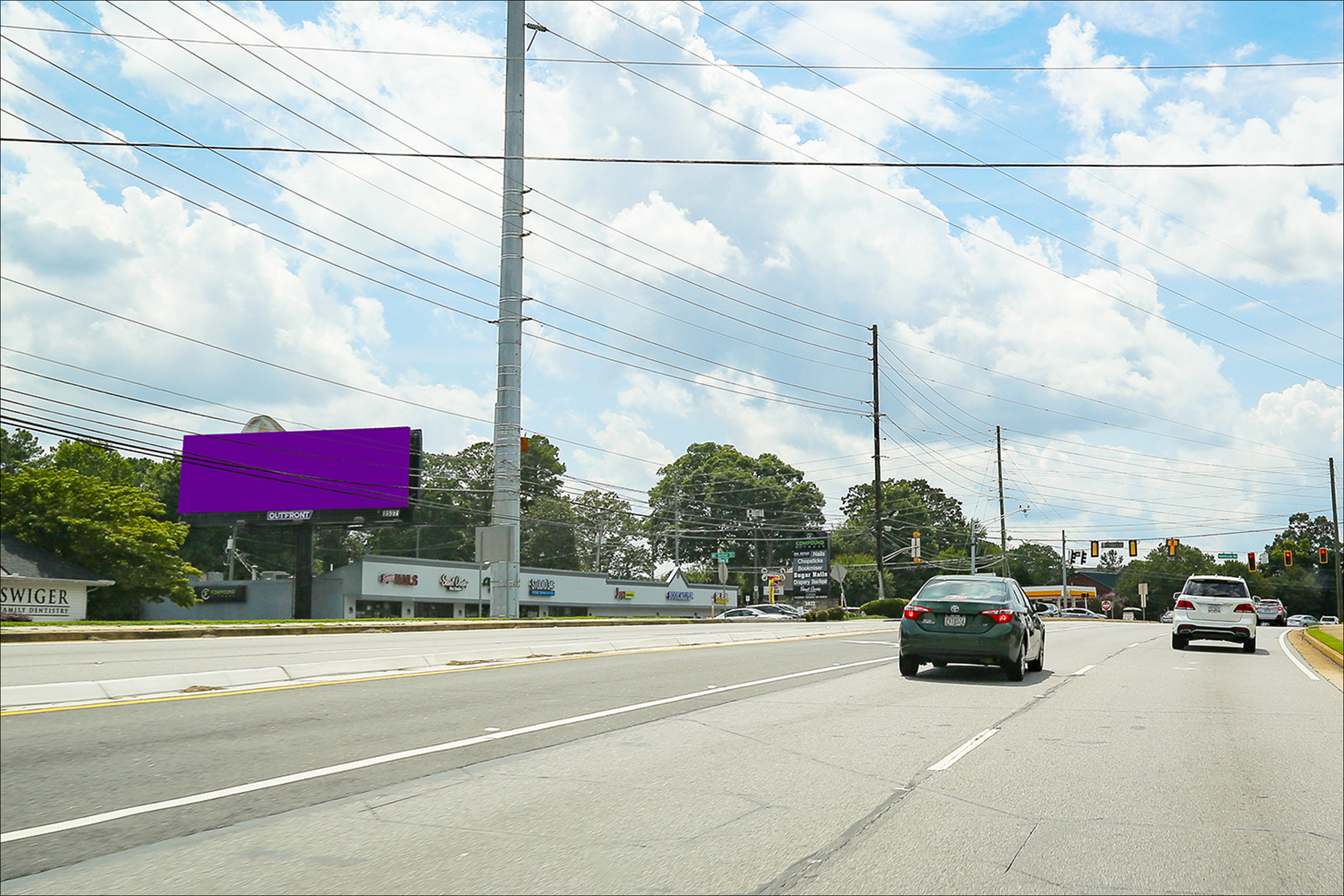 Roswell Rd(GA 120) 200 ft E/O Robinson Rd S/S