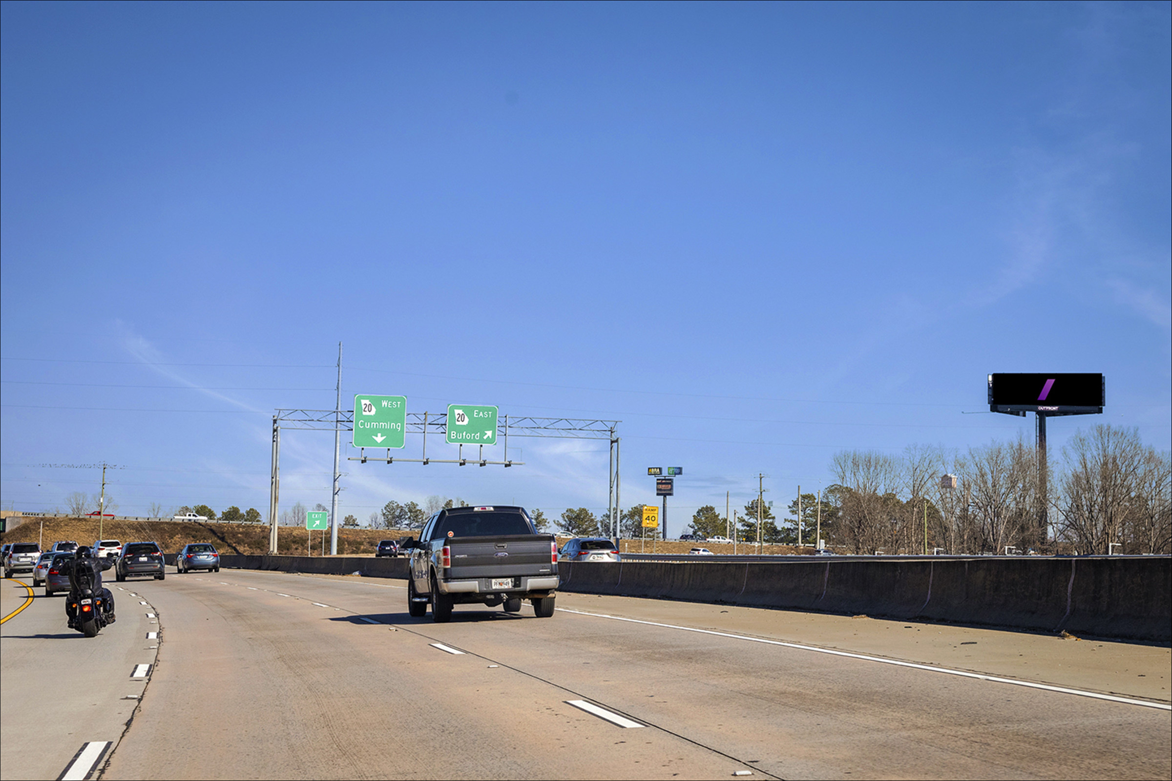 Hwy 400 100 ft S/O Hwy 20 (Buford Hwy) E/S