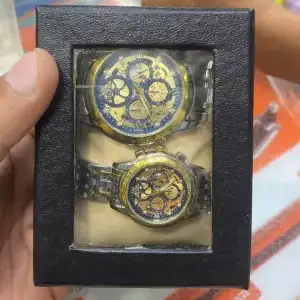 OLEVS Luxury Skeleton Couple Watch Set – Blue & Gold | His & Hers Gift Set