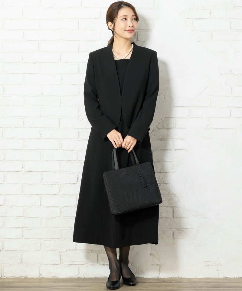 岩佐　タッセル付きジオメトリック二層式バッグ