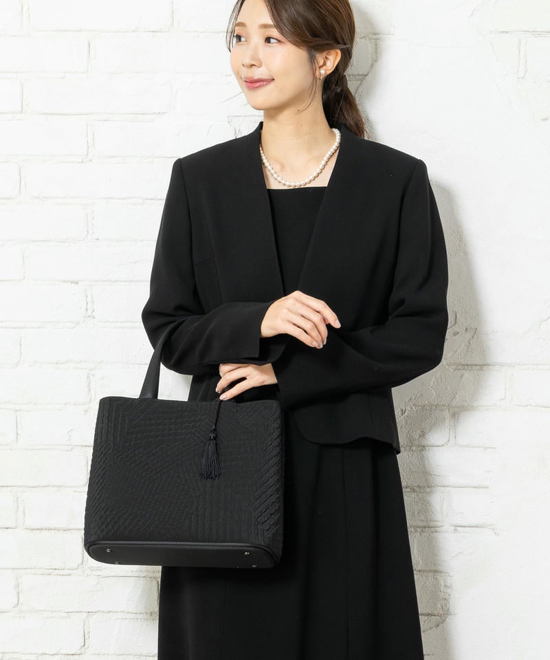 岩佐　タッセル付きジオメトリック二層式バッグ