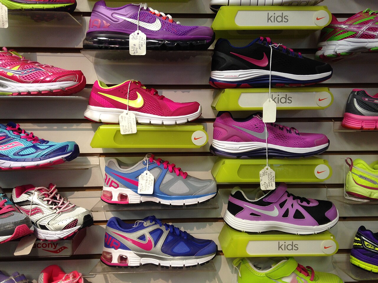 Shoes on display shelves in a footwear store